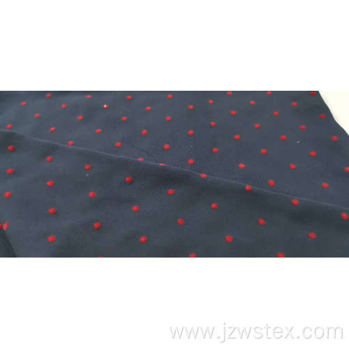 100% Polyester moss crepe with Red flocking